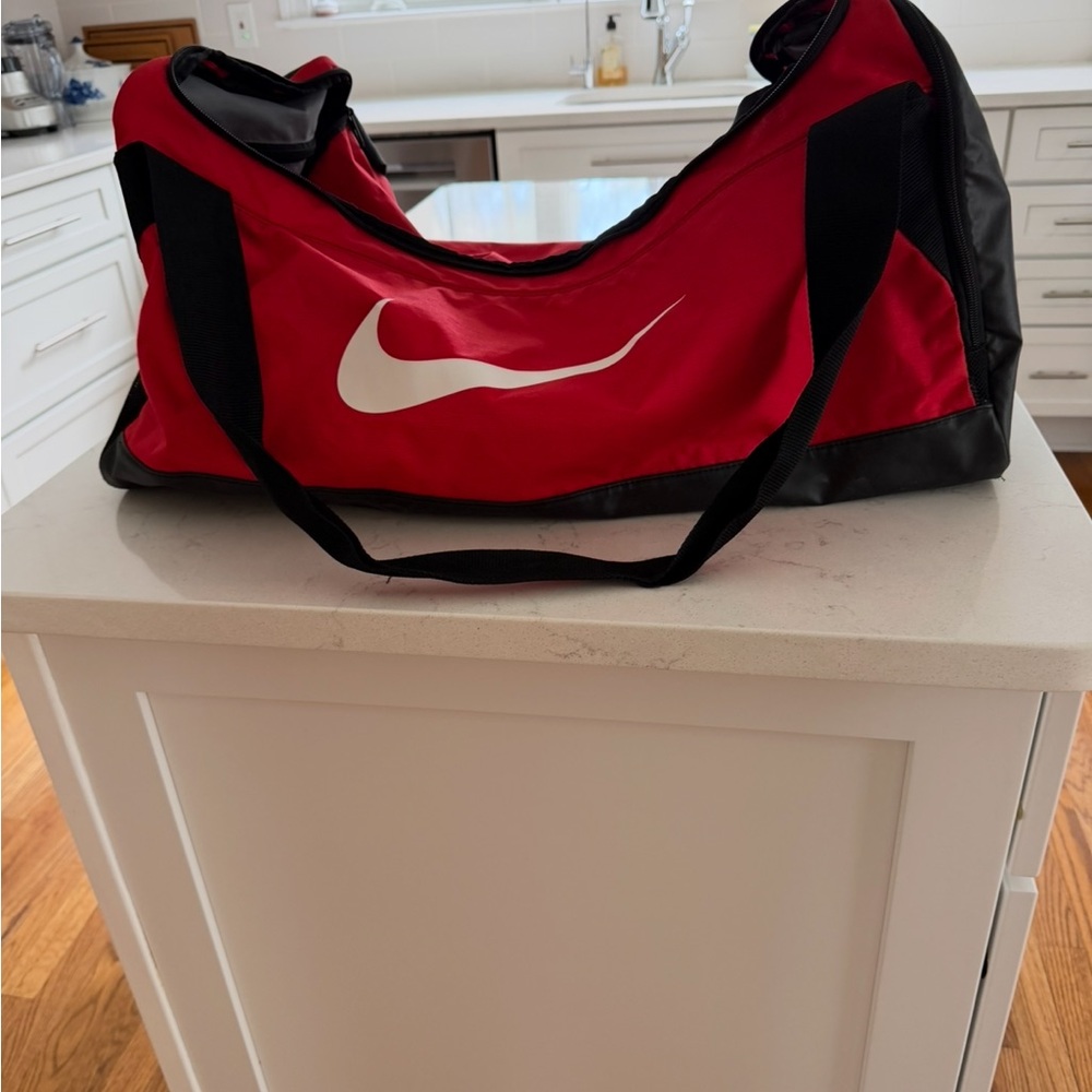 Nike Red and Black Duffel Bag. Ladies